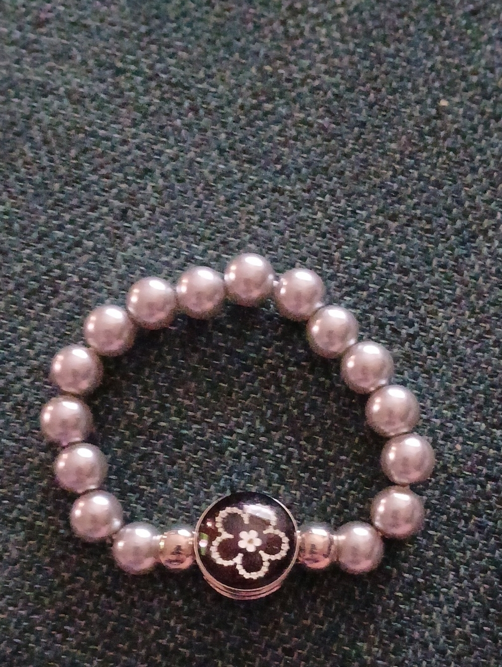 Elegant Gray Beaded Stretch Bracelet with Floral Accent